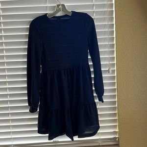 Short dress. 35 inch long. Poliéster and Spandex. S. Navy blue. Long sleeve